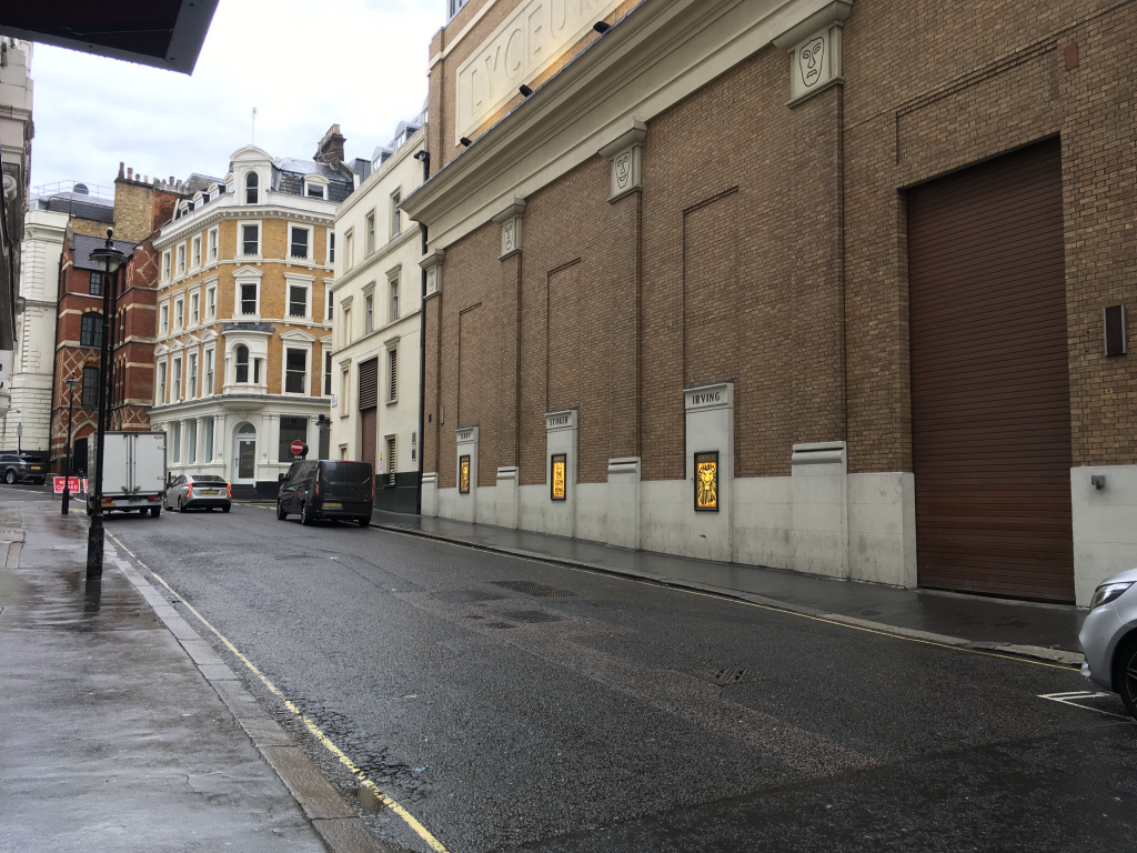 The Burleigh Street side of the Lyceum Theatre. 'Terry', 'Stoker', 'Irving', can be seen carved into the wall.