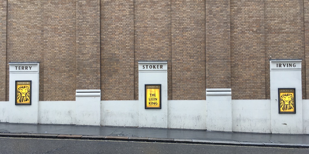 The names 'Terry', 'Stoker', and 'Irving', carved into the Lyceum Theatre on Burleigh Street. Photo by Fran Allfrey.