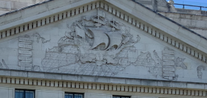 The Bush House rear facade depicting a ship connecting the U.S. and U.K.