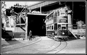 A 33 tram exiting onto the Embankment from a new double-decker tunnel.